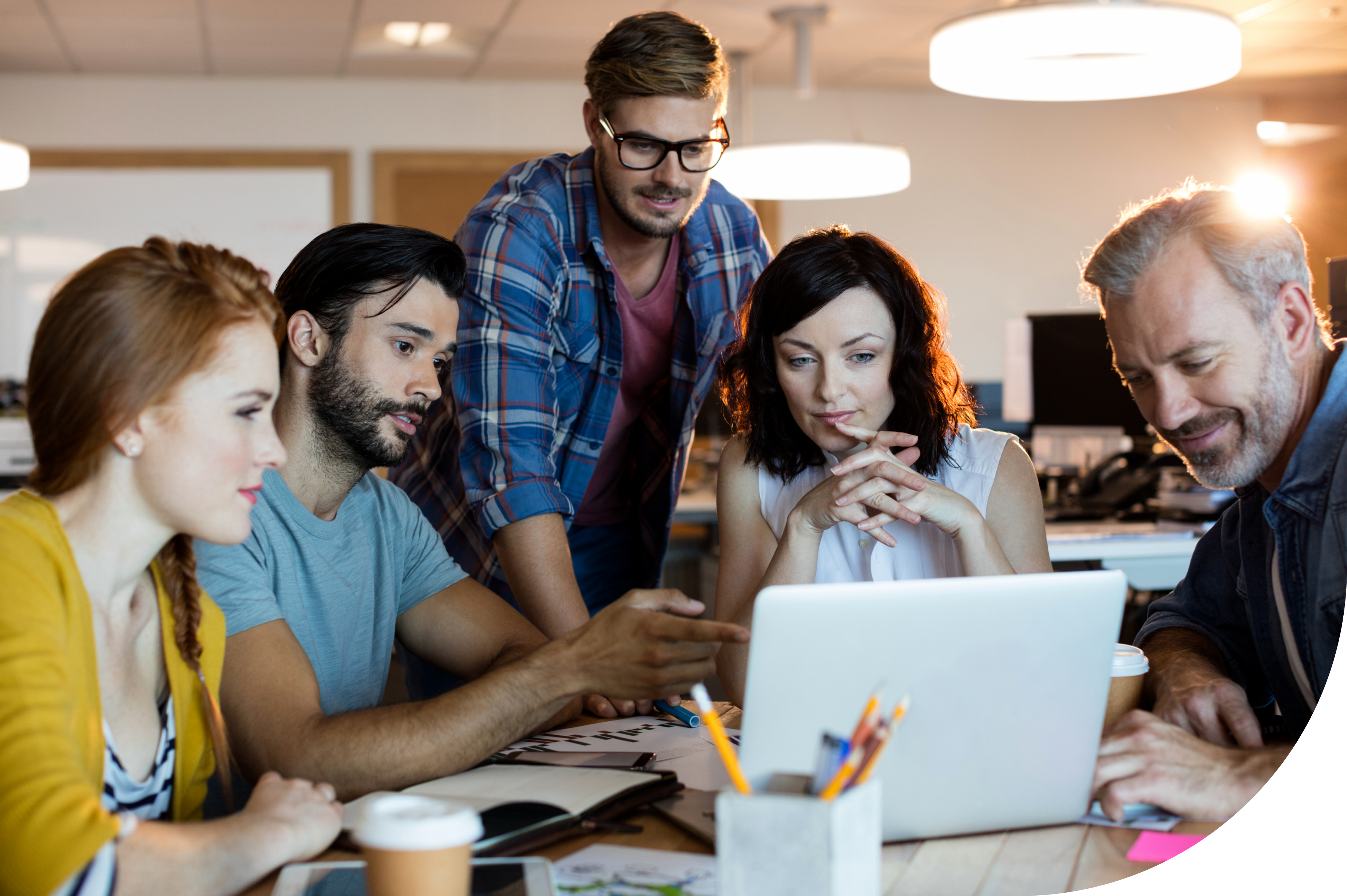 smiling-creative-business-team-discussing-over-the-2021-08-28-18-09-47-utc 1