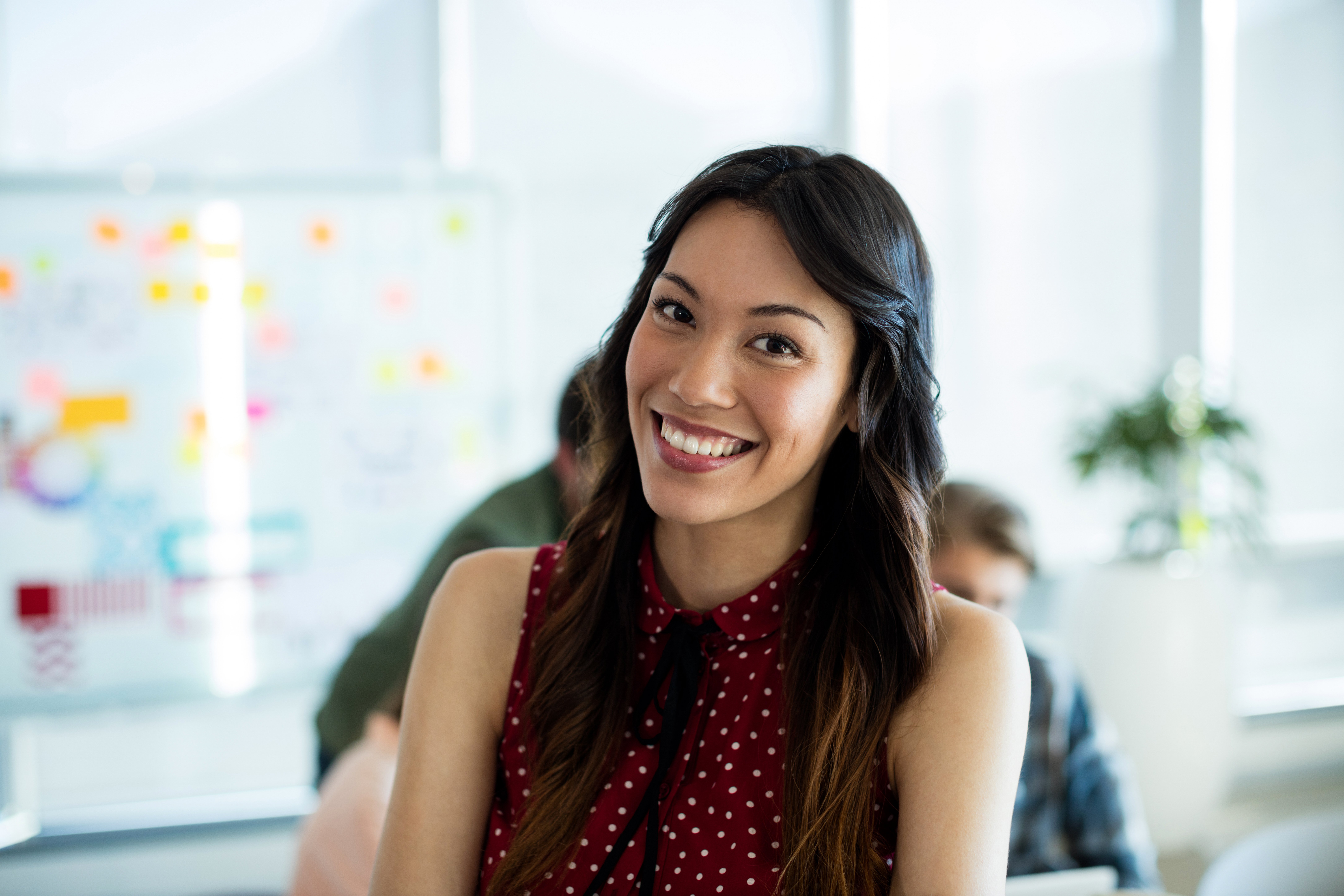 smiling-woman-in-office-2021-08-28-22-12-41-utc